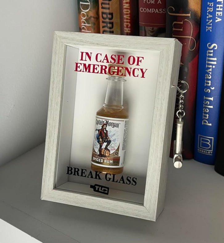 White Emergency Break Glass Display Box on bookshelf